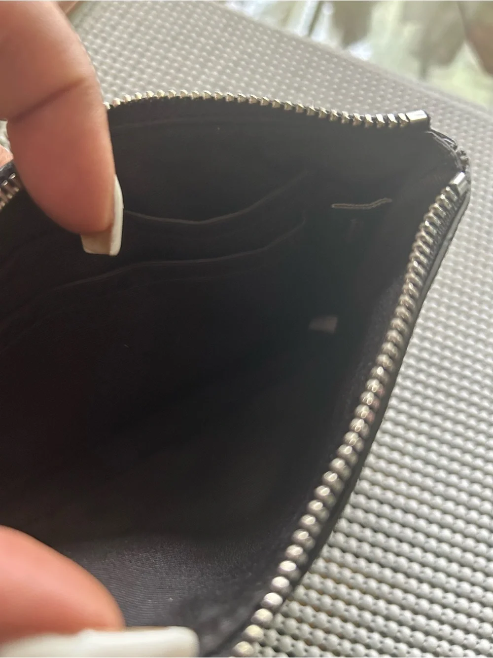 Coach dark brown signature and metallic wristlet